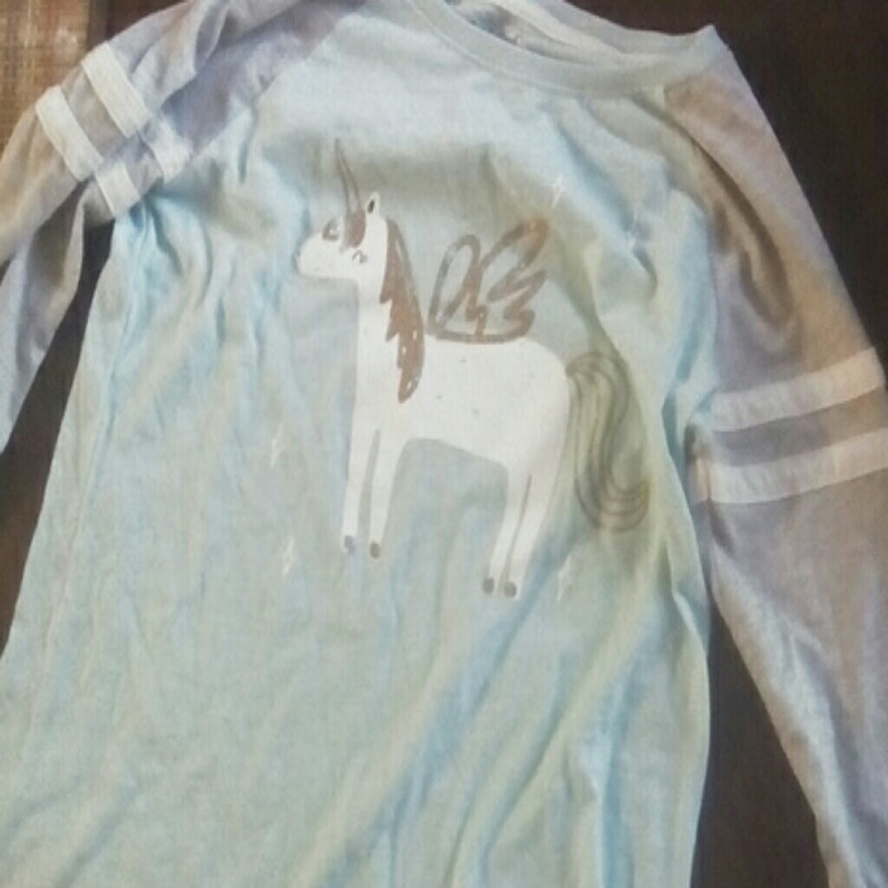 A unicorn shirt and its quarter sleave